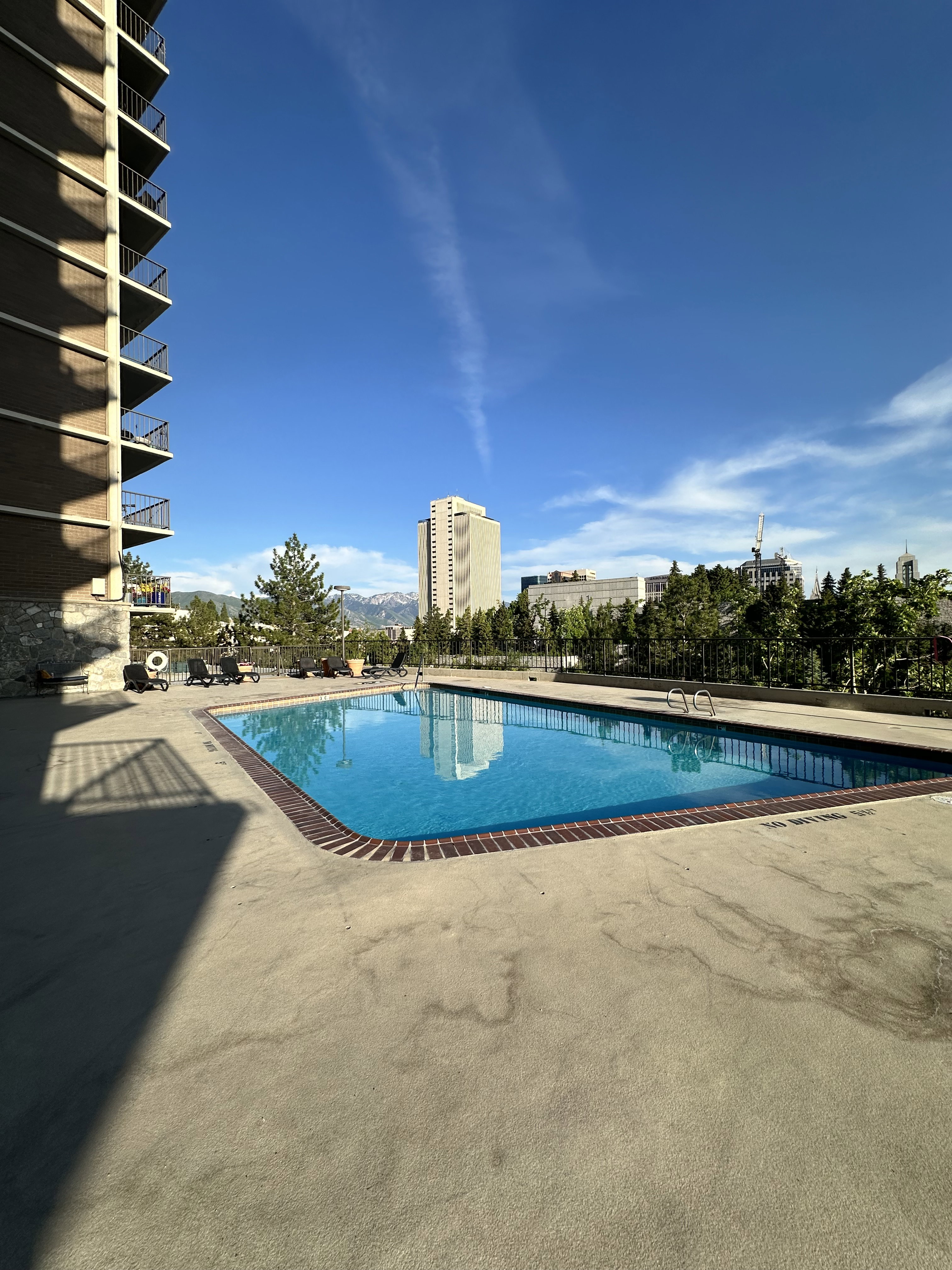 Community pool featuring a patio area