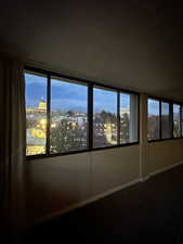 Unfurnished room with a view of city