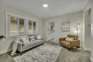 Updated entry room with newer windows. View of Kitchen.