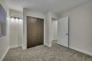 Secondary Bedroom, closet and vanity space with lighting