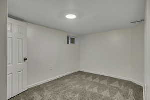 Unfurnished bedroom featuring carpet flooring