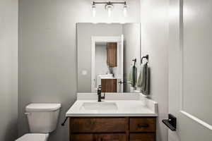 Bathroom with vanity and toilet