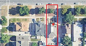 Aerial perspective of suburban area with property parcel outlined