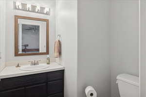 Ensuite bathroom with vanity and toilet