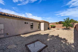 View of fenced backyard