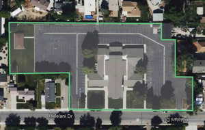 Aerial overview of property's location with property parcel outlined