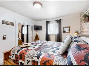 Bedroom featuring multiple windows