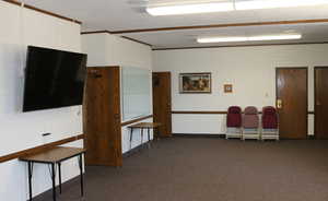 View of multipurpose room with carpet and built-in storage