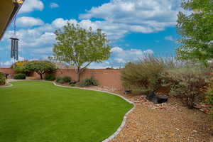 View of fenced backyard