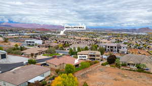 Aerial view of residential area with a mountainous background