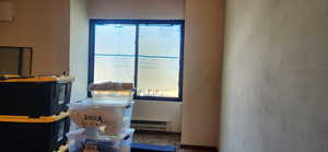 Storage area with a baseboard radiator