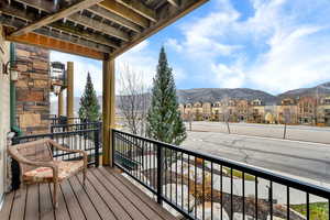 Balcony with a mountain view and a residential view