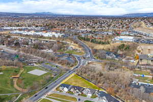 View of property location with nearby suburban area and mountains