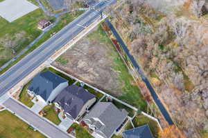 Aerial overview of property's location with nearby suburban area