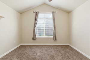2nd bedroom with vaulted ceiling