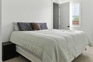 View of carpeted bedroom