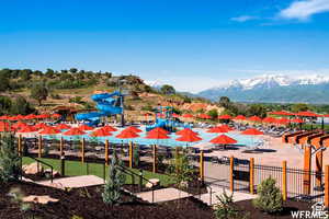 View of playground featuring a mountain view