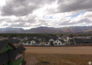 View of mountain background featuring nearby suburban area