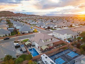 Bird's eye view of a mountain backdrop and a pool area