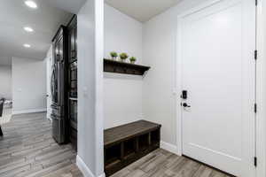 Cubbies and hooks at garage entry