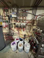 Utility room featuring water heater