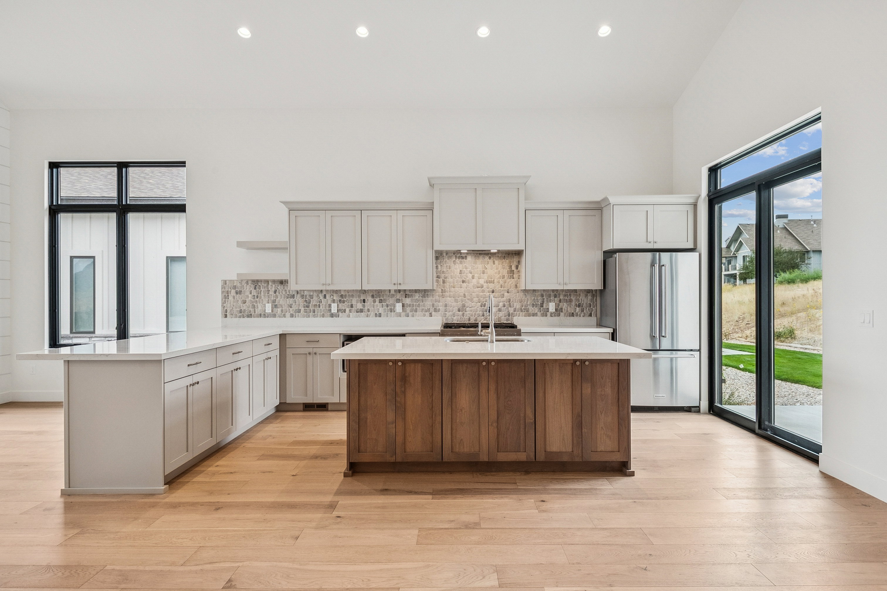 Plenty of storage in the kitchen island and upper and lower cabinetry