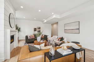 Main level entrance into a cozy family room with gas fireplace, 3 bedrooms, 2.5 baths, mudroom/laundry and direct garage access.