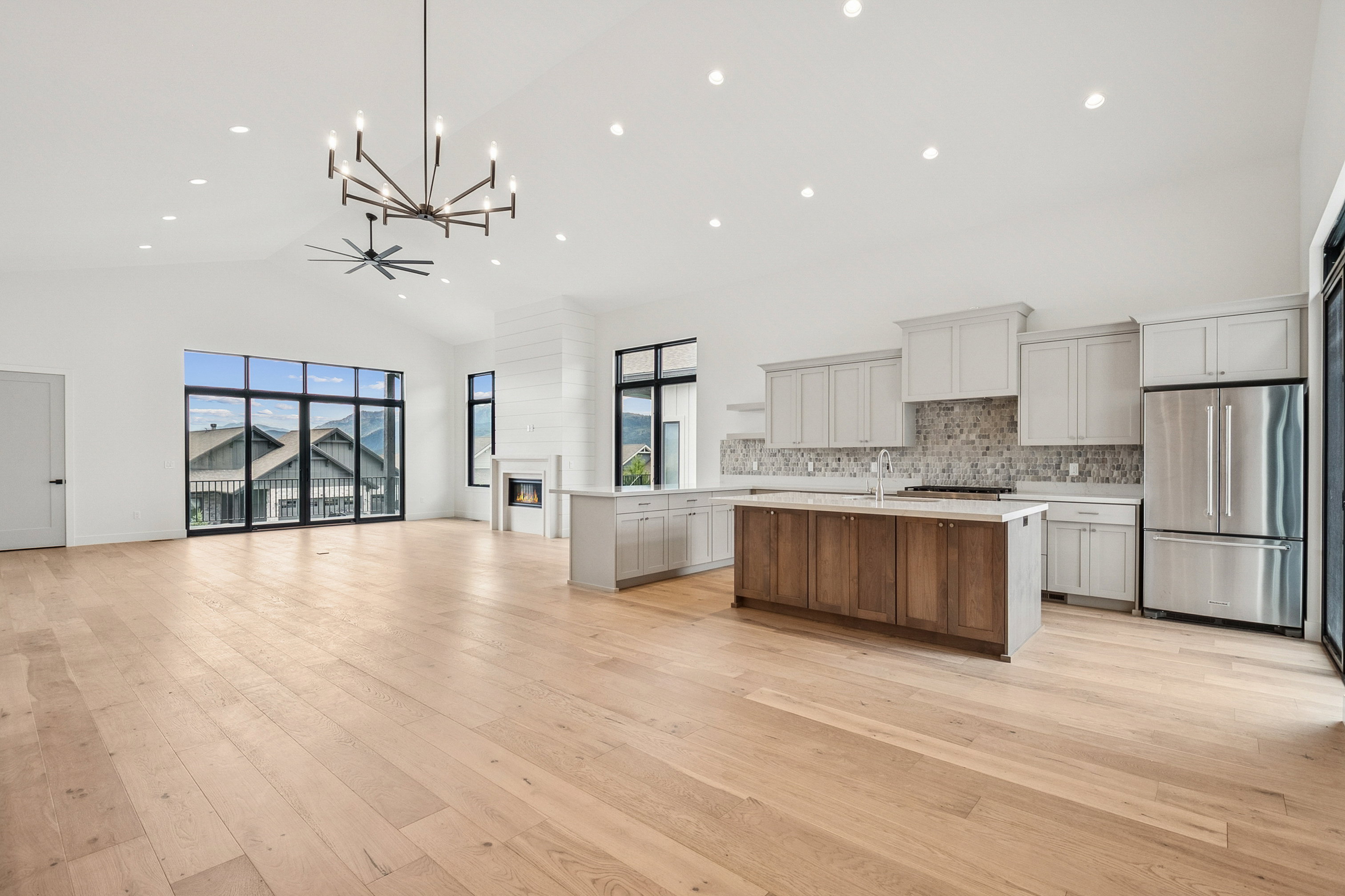 Large gathering family room, kitchen and eating area.