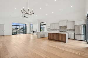 Large gathering family room, kitchen and eating area.