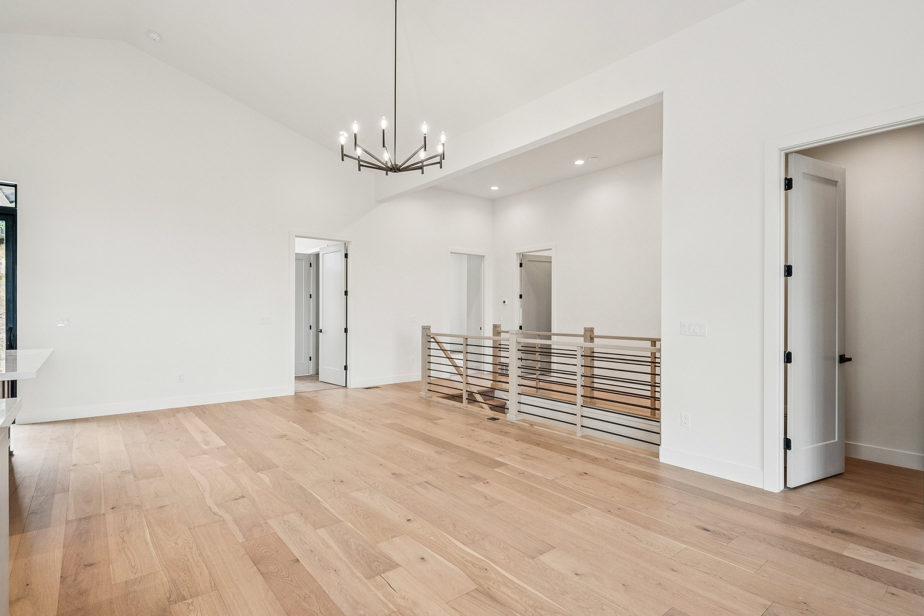 Stairs from main level to upper level dining, kitchen, family rooms, 3 bedrooms, 2.5 baths