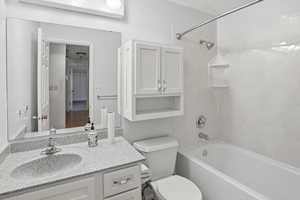 Bathroom with bathtub / shower combination and vanity