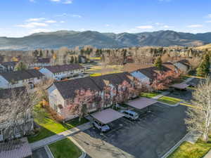 Aerial view of residential area featuring a mountain backdrop
