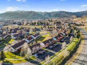 Aerial view of residential area with a mountain backdrop