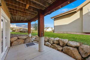 View of patio with a mountain view