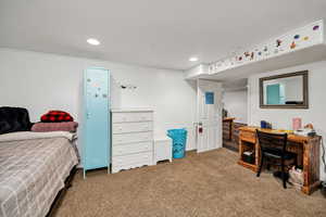 Bedroom featuring carpet floors and recessed lighting