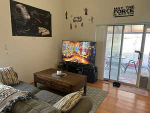 Living room featuring wood finished floors
