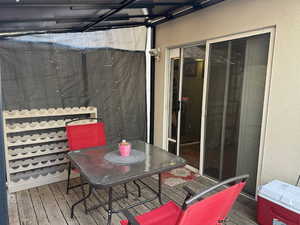 Wooden deck with outdoor dining area