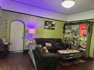 Living area featuring dark wood-style flooring