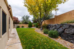 View of fenced backyard