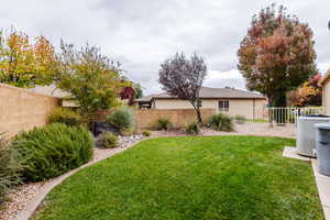 View of fenced backyard