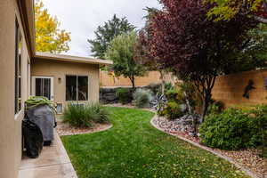 View of fenced backyard