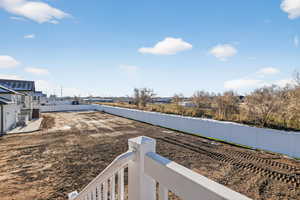 View of fenced backyard