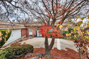 View of front of home featuring brick siding