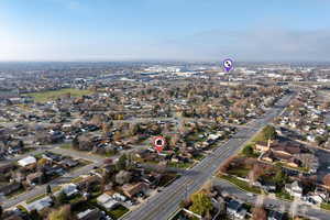 Aerial overview of property's location with nearby suburban area
