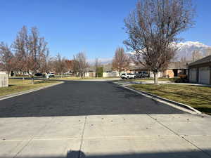 View of community and mountains from driveway