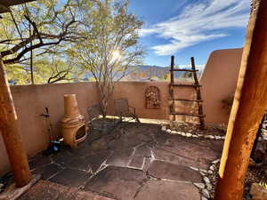 View of patio with a mountain view