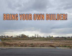 View of asphalt street with curbs
