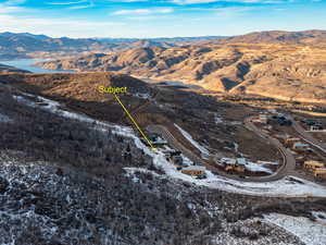 Snowy aerial view with a mountain view