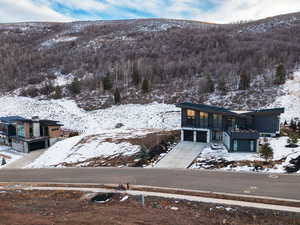 Snowy aerial view with a mountain view