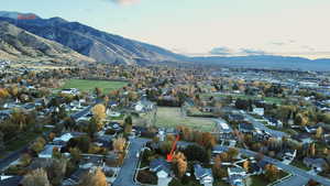 Mountain view featuring nearby suburban area